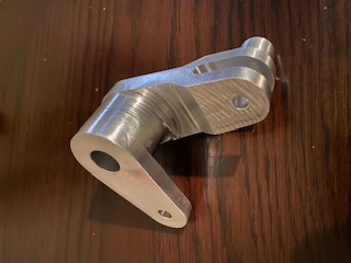 CNC machined metal component with tight tolerances